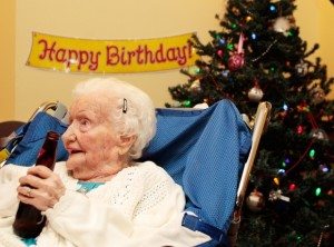 Merle Barwis, who turned 113 in December, will on Monday become the oldest British Columbian ever. She is pictured enjoying a beer with family in Victoria on her 111th brithday. File photo. (LYLE STAFFORD, TIMES COLONIST). Photograph by: LYLE STAFFORD , TIMES COLONIST