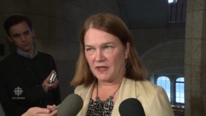 Health Minister Jane Philpott talks to reporters about the need for a National Dementia Strategy outside the Commons.