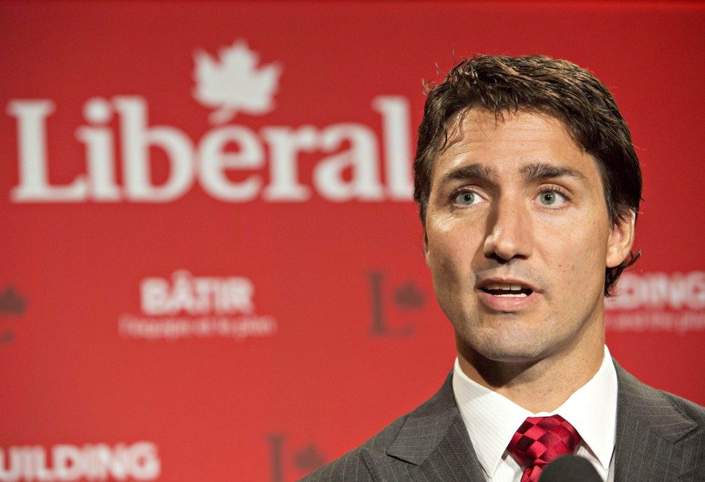 Liberal Leader Justin Trudeau speaks in Edmonton on Aug. 20, 2014. THE CANADIAN PRESS/Jason Franson ORG XMIT: CPT113